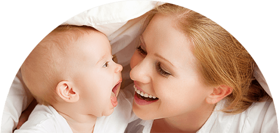 Mother laughing with her infant